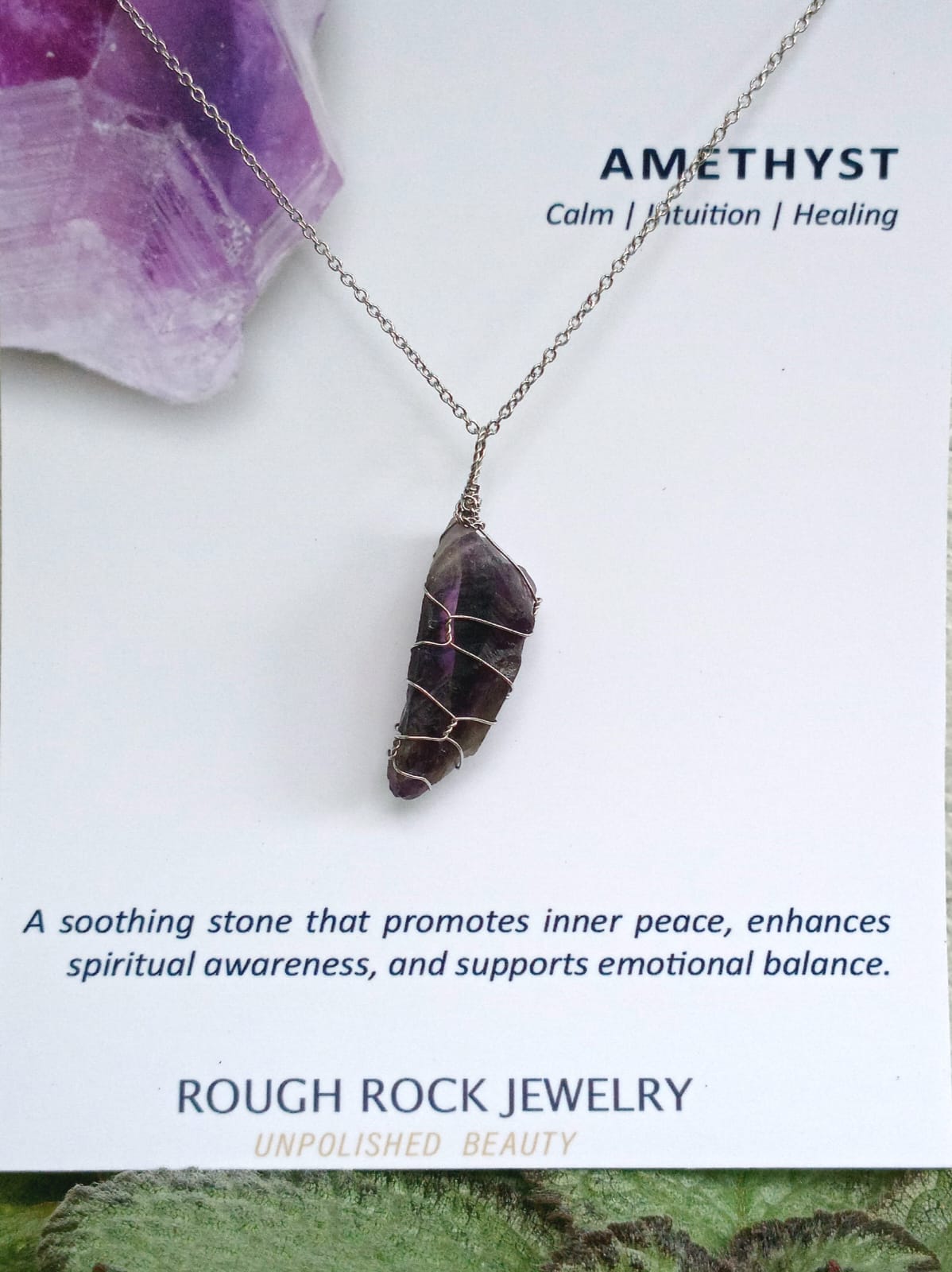 Amethyst necklace with crystal on a white background, featuring Rough Rock Jewelry branding.