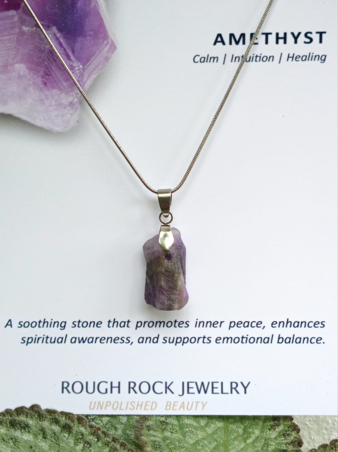 Amethyst pendant necklace with descriptive text on a white background