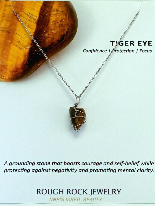 Tiger eye necklace on a white background with text about its properties and brand.
